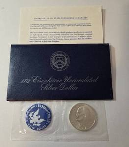 lot 12 image: 1972 Eisenhower Ike Dollar - Blue Label - 40% Silver