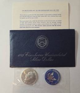 lot 13 image: 1972 Eisenhower Ike Dollar - Blue Label - 40% Silver