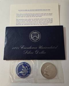 lot 15 image: 1971 Eisenhower Ike Dollar - Blue Label - 40% Silver
