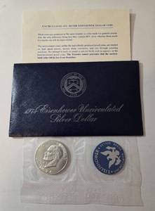 lot 16 image: 1974 Eisenhower Ike Dollar - Blue Label - 40% Silver