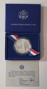 lot 20 image: 1986 Liberty Silver Dollar - COA - VERY COLLECTIBLE