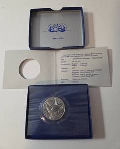 lot 21 image: 1986 Liberty Half Dollar Coin Unc. - COA