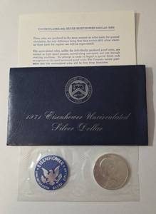 lot 28 image: 1971 Eisenhower Ike Dollar - Blue Label - 40% Silver