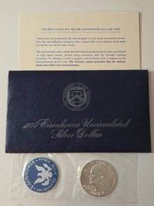 lot 33 image: 1974 Eisenhower Ike Dollar - Blue Label - 40% Silver