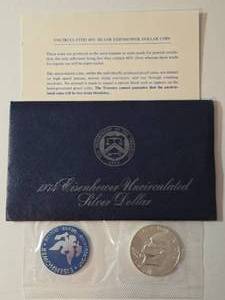 lot 34 image: 1974 Eisenhower Ike Dollar - Blue Label - 40% Silver