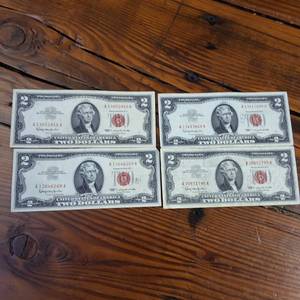 lot 145 image: 1963 Crisp & Clean RED SEAL 2$ United States Notes (Not federal reserve notes)  4 notes total