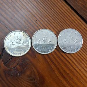lot 60 image: Lot of 3  1950, 1951 and 1952 Silver Canada Dollars  80% silver  Great, bright condition
