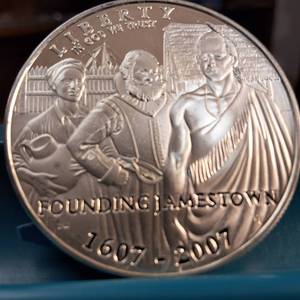 lot 65 image: 2007-P Jamestown Silver Dollar is a 90% silver commemorative coin  26.730 grams
