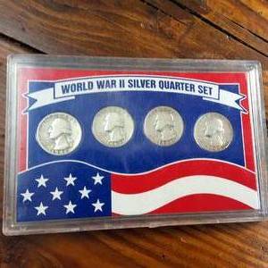 lot 33 image: WWII-era silver quarter sets (1942�1945)�contain 90% silver Washington quarters minted during the war