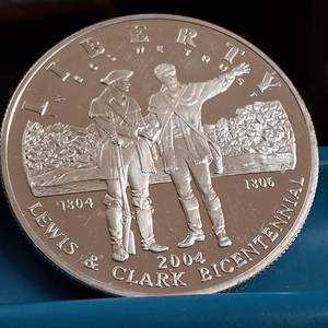 lot 68 image: 2004 Lewis and Clark Silver Dollar is a 90% silver commemorative coin  26.730 grams