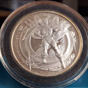 lot 77 image: (1987) 1 Troy Ounce .999 Silver Round featuring �SHAZAM� AMC Mint Cartoon Celebrity Series