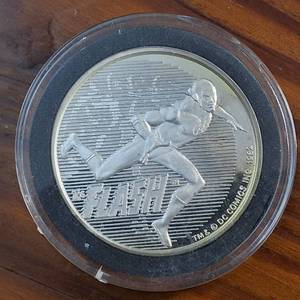 lot 80 image: (1987) 1 Troy Ounce .999 Silver Round featuring �FLASH� AMC Mint Cartoon Celebrity Series