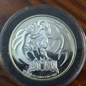 lot 83 image: (1987) 1 Troy Ounce .999 Silver Round featuring �BAT MAN� AMC Mint Cartoon Celebrity Series