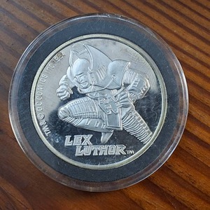 lot 86 image: (1987) 1 Troy Ounce .999 Silver Round featuring �Lex Luther� AMC Mint Cartoon Celebrity Series