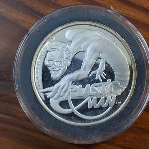 lot 89 image: (1987) 1 Troy Ounce .999 Silver Round featuring �Plastic Man� AMC Mint Cartoon Celebrity Series