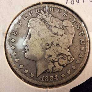 lot 78 image: 1884S Morgan silver dollar  Weight 26.7 grams 90% silver  Most popular by the US Mint