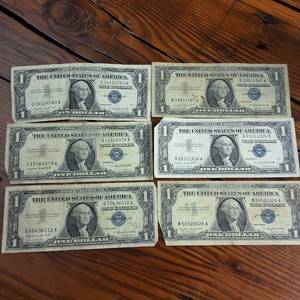 lot 87 image: 6 Total Circulated Silver Certificate Blue Seal Banknotes � Circulated 1957A series