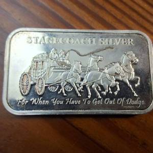 lot 104 image: 1 OZ .999 Fine Silver Bar  Vintage Fractional Stagecoach Silver  Dividable Bar