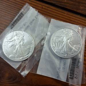 lot 105 image: Lot of 2 total BU 2024 American Silver Eagles  .999 Silver  Weight 31.1 g Diameter 40.6 mm