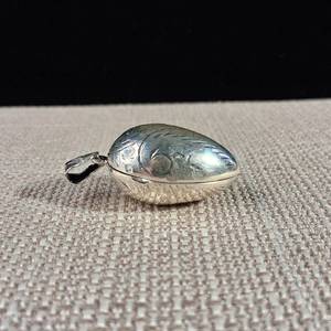 lot 115 image: Decorative Engraved Egg Shaped Locket - Pill Container - 1 58inch - 8.4g - Sterling Silver