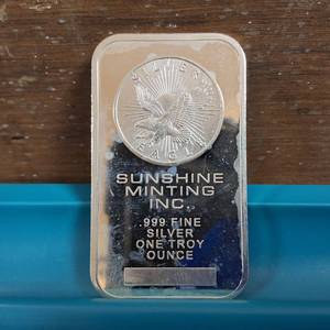 lot 242 image: Sunshine Mint 1 Troy Ounce .999 Fine Silver Bar