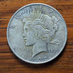 lot 270 image: 1922-D Peace Dollar 90% Silver, 26.73 grams  circulated-nice 0.77344 troy ounces silver
