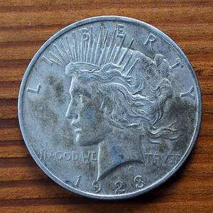lot 279 image: 1923-D Peace Dollar 90% Silver, 26.73 grams  circulated 0.77344 troy ounces silver