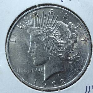 lot 288 image: 1922 Peace Dollar 90% Silver, 26.73 grams  Circulated 0.77344 troy ounces silver  Bright (VG)