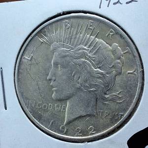 lot 294 image: 1922 Peace Dollar 90% Silver, 26.73 grams  Circulated 0.77344 troy ounces silver  Nice & Bright