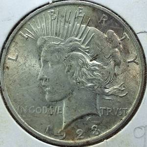lot 297 image: 1923 Peace Dollar 90% Silver, 26.73 grams  Circulated 0.77344 troy ounces silver  (EF)