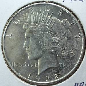 lot 363 image: 1922 Peace Dollar 90% Silver, 26.73 grams  Circulated 0.77344 troy ounces silver  Bright (VG)