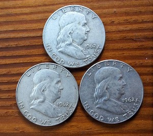 lot 380 image: Lot of 3 1962 Franklin Half Dollars  90% silver, 10% copper coin  .36 oz silver each  Circulated