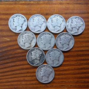 lot 339 image: Lot of 10 Various Years Mercury Dimes  90% silver in circulated condition  One Dollar Face Value