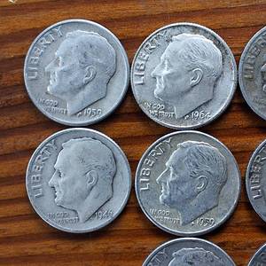 lot 343 image: Lot of 10 Various Years Roosevelt Dimes  90% silver in circulated condition, One Dollar Face Value
