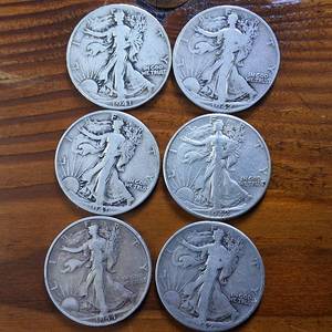 lot 405 image: Lot of 6 1941 (3 coins) � 1942 (2 coins)  1944(1 coin) Walking Liberty Half Dollars Circulated 90% Silver  $3 FV