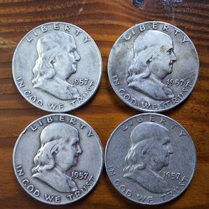 lot 324 image: Lot of 4 1957-D Franklin Half Dollars  90% silver, (Circulated � One is Very Fine)   $2 Face Value