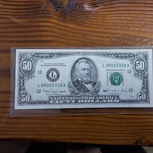 lot 322 image: Crisp, uncreased  Series 1990 High Number $50 FRN  Bleed Through Error  Rare