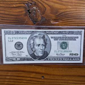 lot 364 image: Rare 2001 $20 Federal Reserve Note - Significant MiscutOffset Error  VF circulated condition