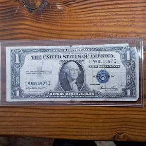 lot 384 image: Series 1935-E $1 Silver Certificate  Circulated  Blue Seal  Collectible  Payable to Bearer