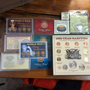 lot 416 image: Large Collection of Collectible & Historic Coins in booklet form  Verified and Certified Authentic