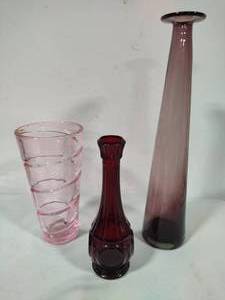 lot 16 image: Wheaton Bullseye Ruby Red Bud Vase, Pink Swirl Vase & Tall Amethyst Vase