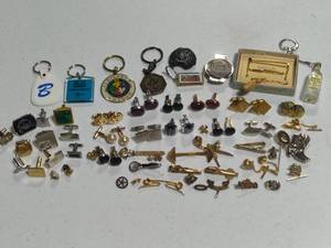 lot 121 image: Large Lot of Cuff Links, Key Chains, Etc.