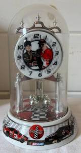 lot 29 image: Dale Earnhardt Sr and Jr Glass Domed Porcelain Anniversary Clock