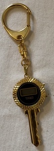 lot 109 image: Tinko Brand Digital Clock Keychain