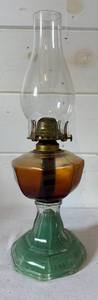 lot 133 image: Vintage Kerosene Oil Lamp with Green Base
