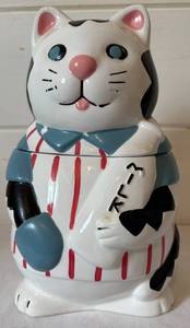 lot 137 image: Vintage Cat Holding Bottle of Milk Cookie Jar
