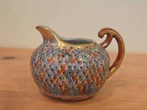 Japanese Thousand Faces Porcelain Creamer