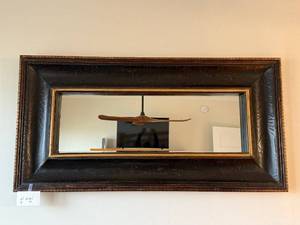 lot 7 image: Leather Look Black Mirror Frame with Gold Trim - 31 x 16 in