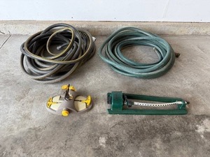 lot 44 image: Two Sprinklers & Two Yard Hoses
