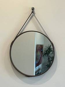 lot 53 image: Round Wall Mirror with Brown Leather Strap Hanger